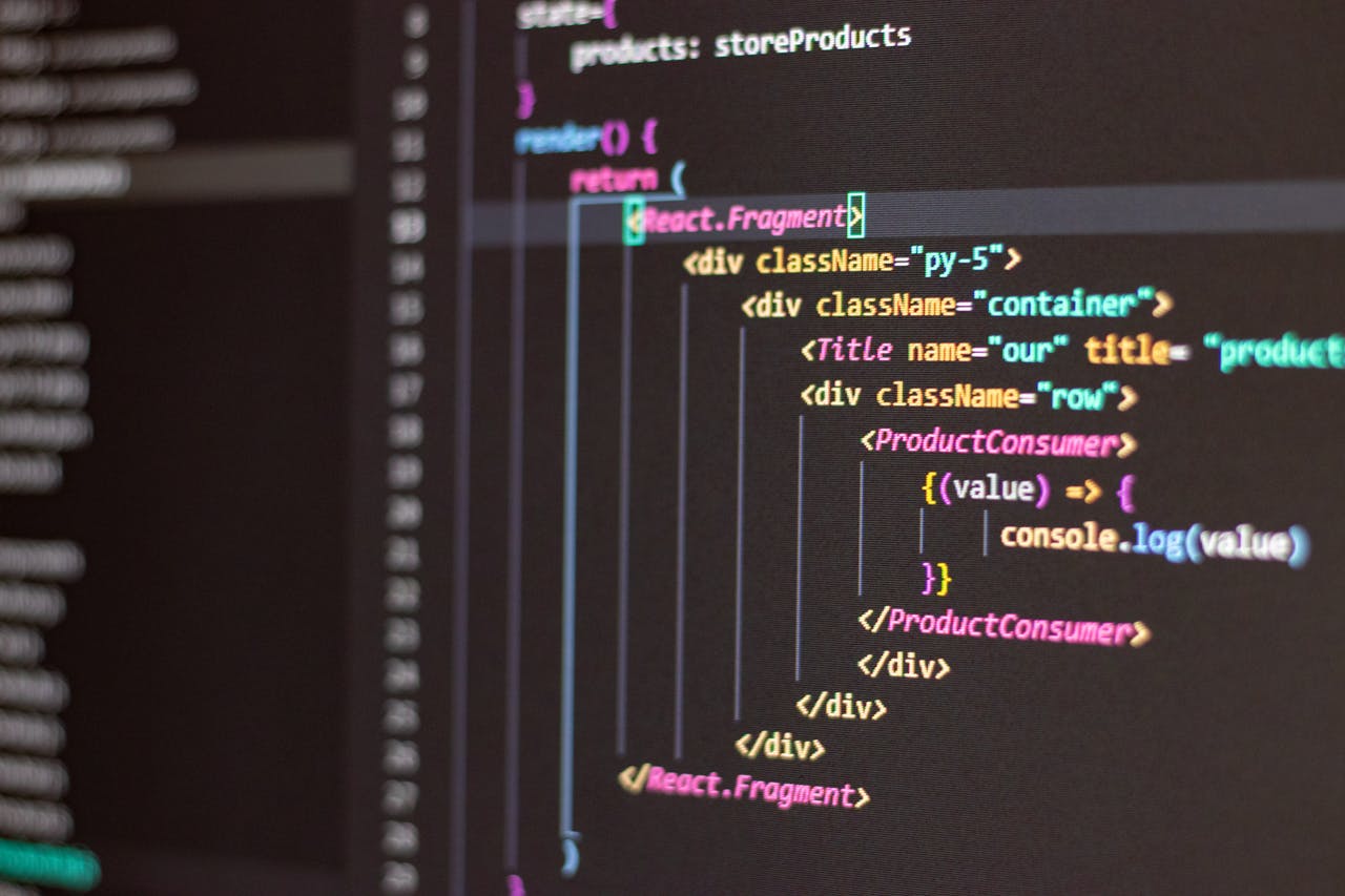The Art of Drawing Readers In: Your attractive post title goes here Close-up of HTML and JavaScript code on a computer screen in Visual Studio Code.