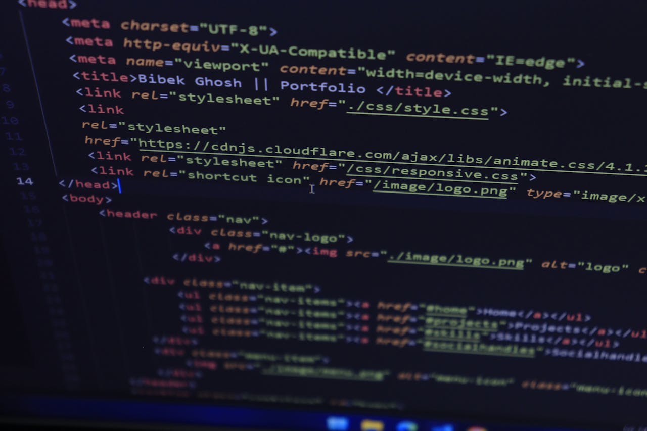 about-01 Close-up of HTML and CSS code displayed on a computer screen, ideal for tech and programming themes.