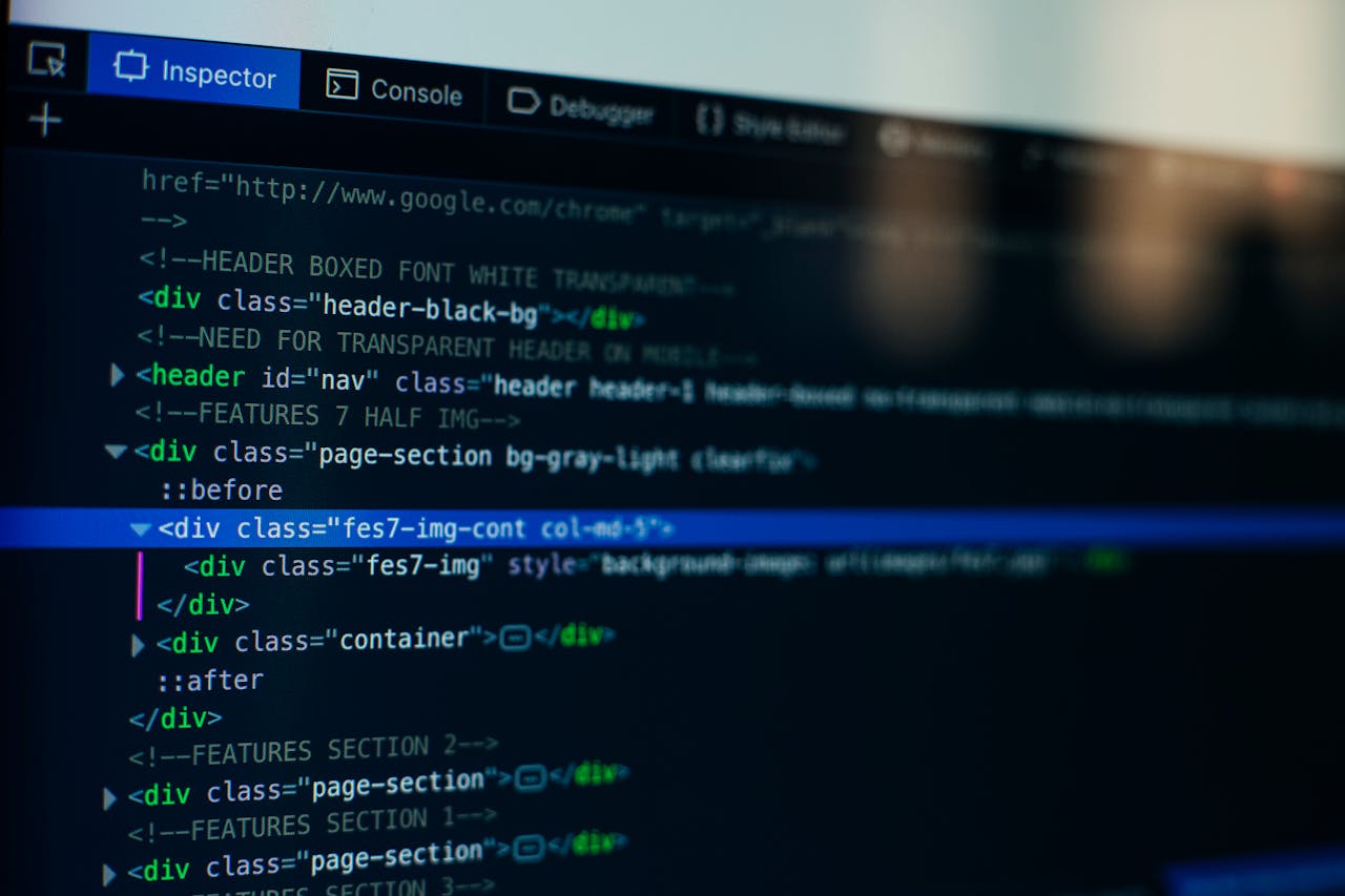 services-01 Detailed view of HTML code on a computer screen, ideal for tech and software development themes.