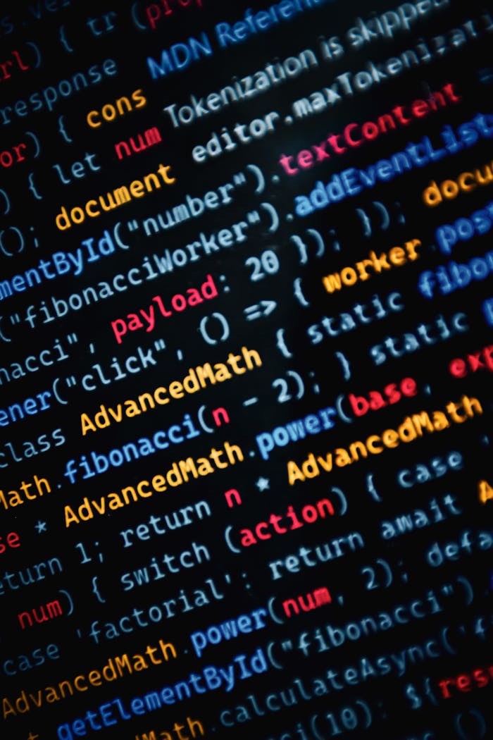 gallery-4 Close-up of vibrant JavaScript code displayed on a monitor showcasing web development.