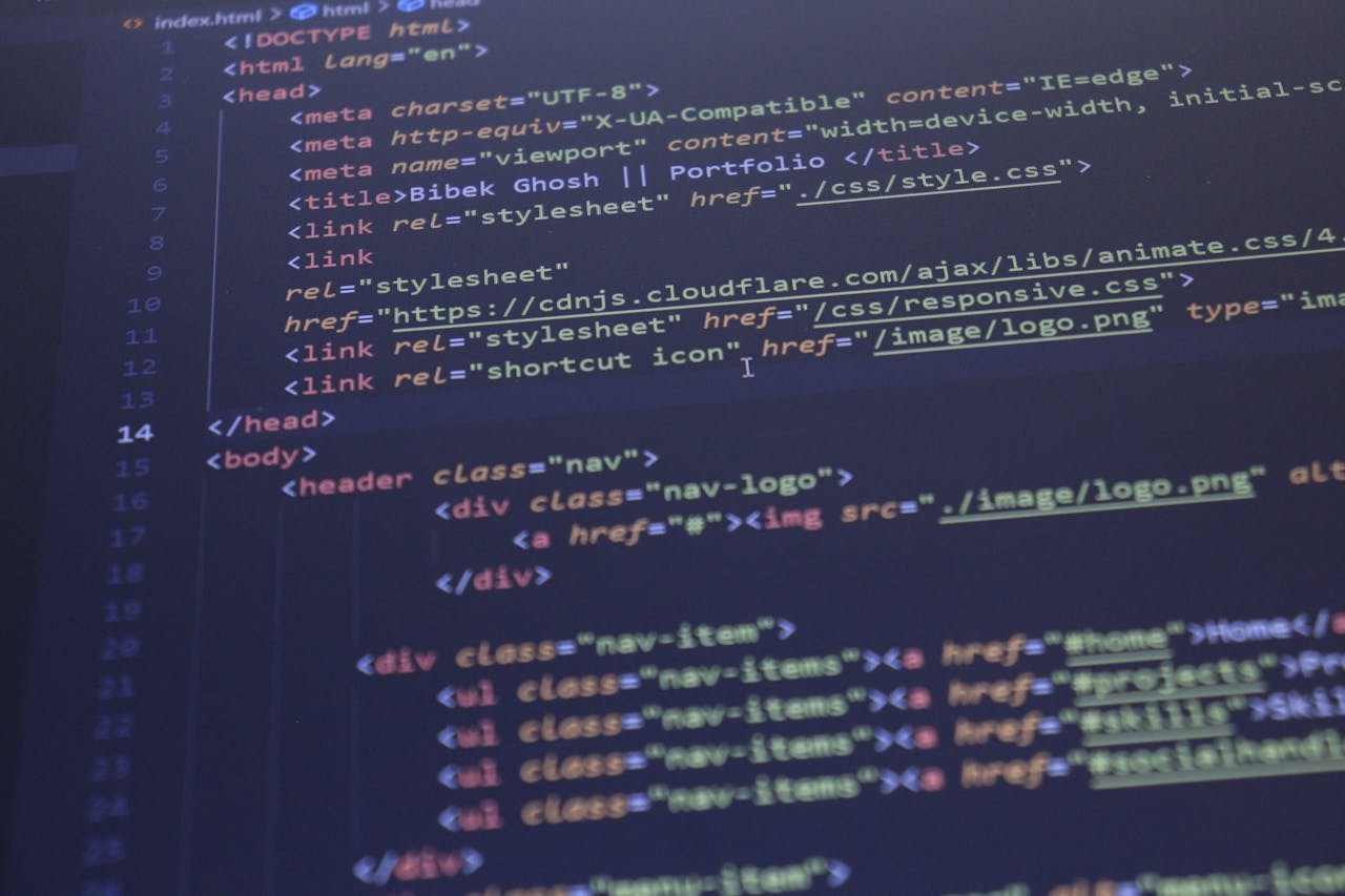 services-04 Close-up view of HTML and CSS code displayed on a computer screen, ideal for programming and technology themes.
