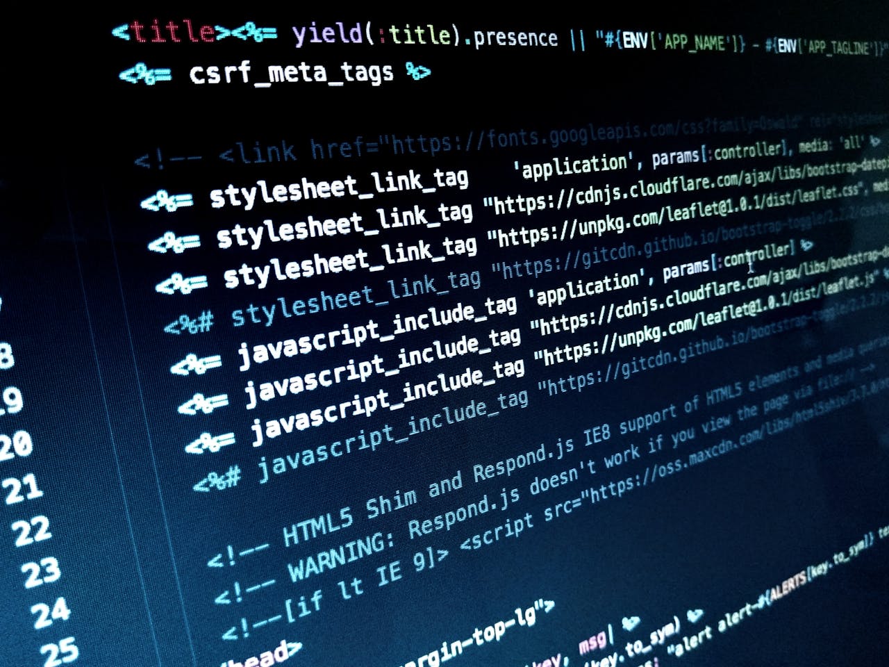 services-02 Detailed view of HTML and JavaScript code displayed on a computer monitor.